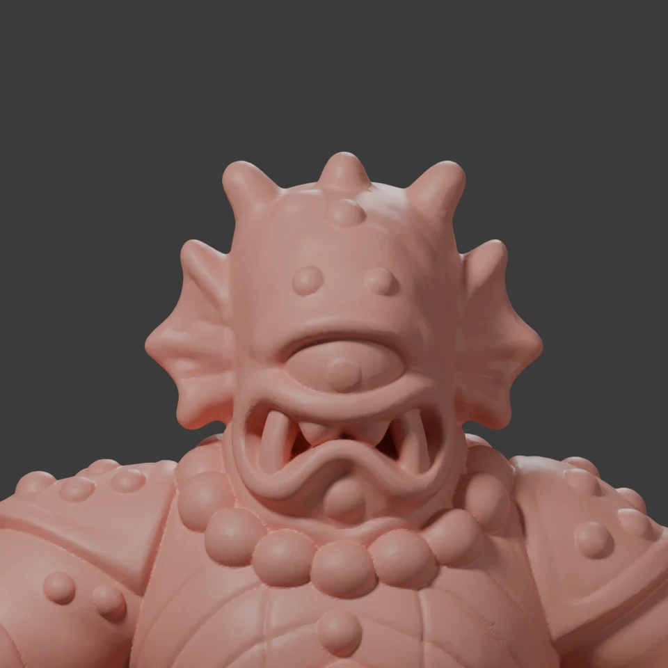 Front of the Test B head: the eye has a small pupil, the teeth are separate thin fangs, and the skin is smooth.