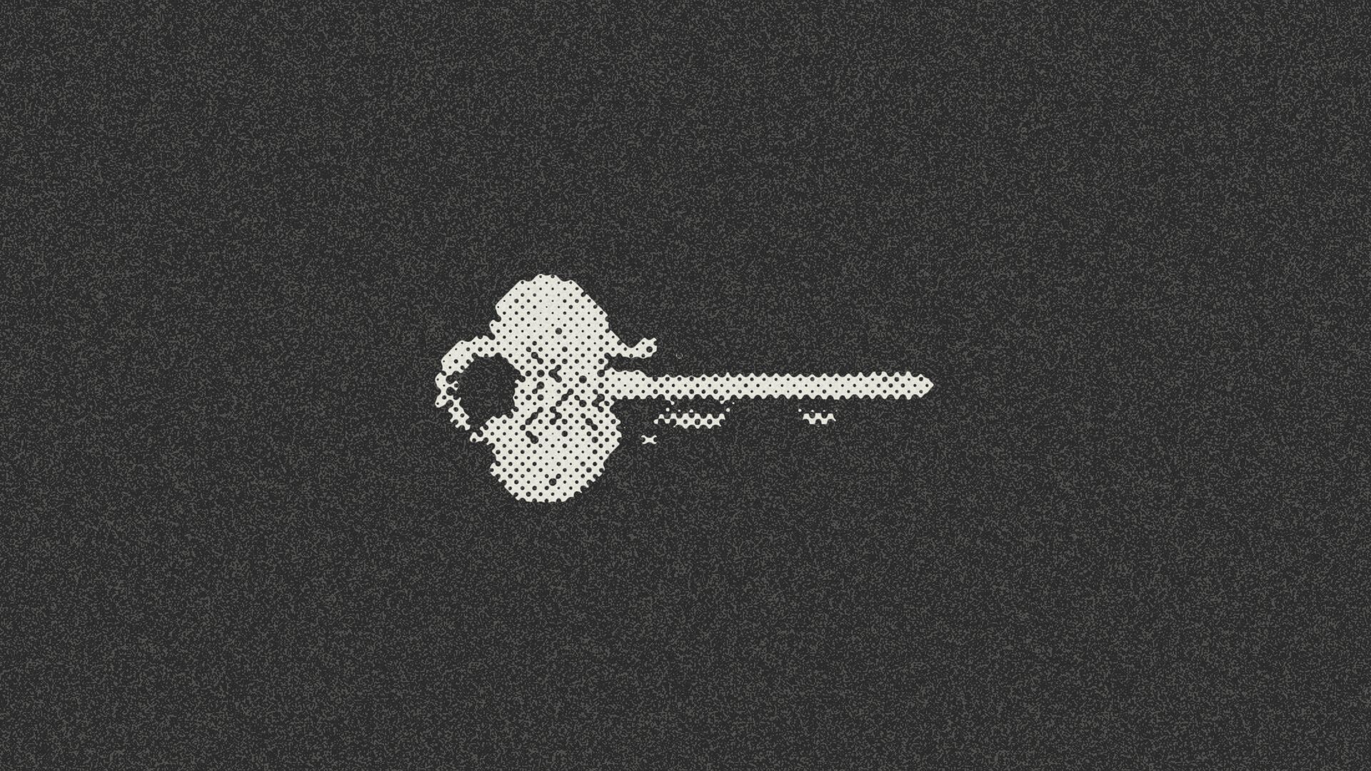 Paper halftone photograph of a single vintage key against a dark background